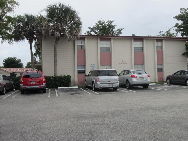 Building Photo - 10812 Royal Palm Blvd Unit 10812