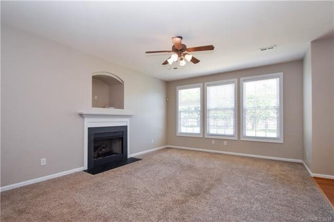 Photo - 4 BR/2.5BA Community Pool | Fenced backyard!