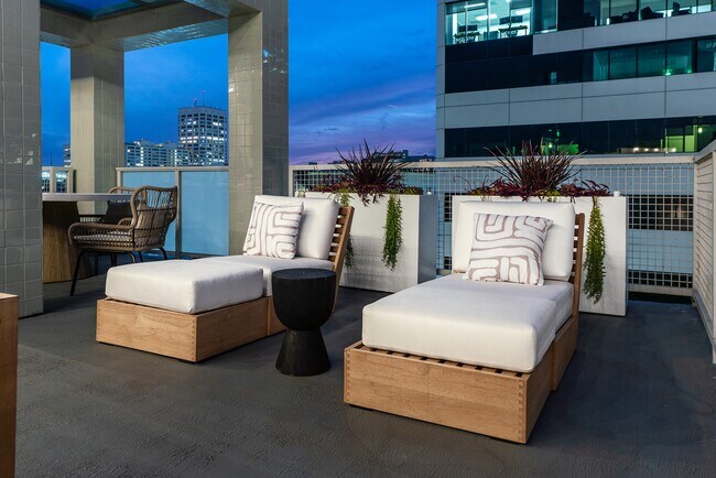 Serenity and Style: Lounge Chairs on Riva's Rooftop Deck