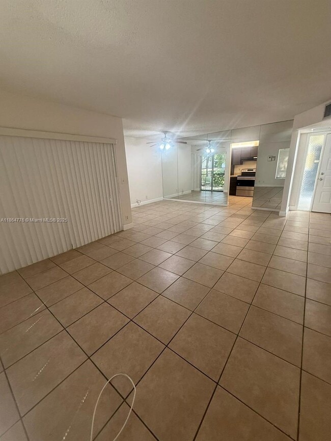 Building Photo - 3439 Cocoplum Cir Unit 3420 Rental