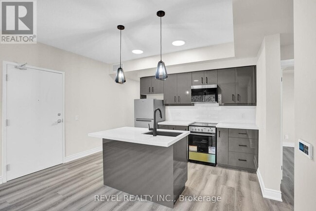 Photo - 261 King St E Unité 2D