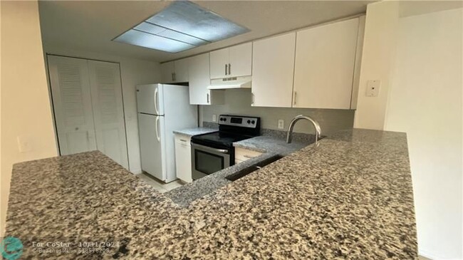 Photo - 5045 Wiles Rd Condo Unit 205