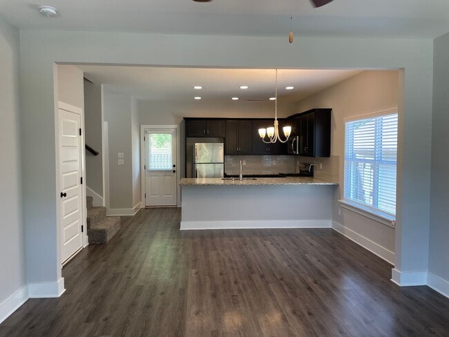 Photo - 3 Bedroom Home with Garage and Flat Fenced Backyard!