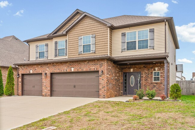 Photo - Four Bedroom with Three Car Garage!