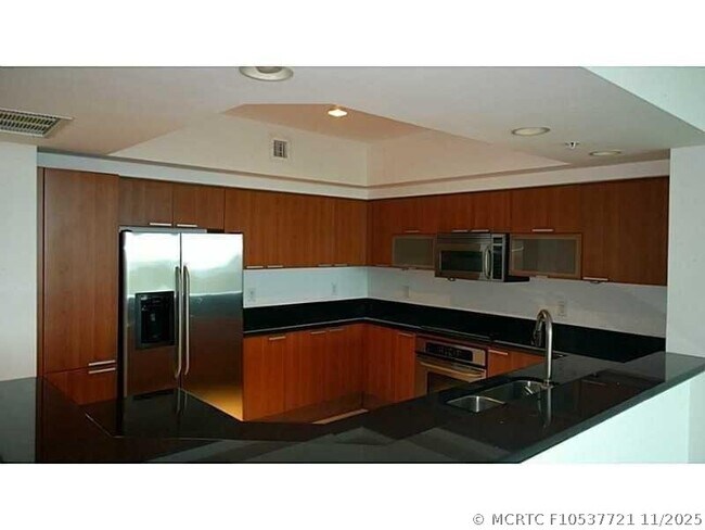 Building Photo - 14951 Royal Oaks Ln Unit 1608