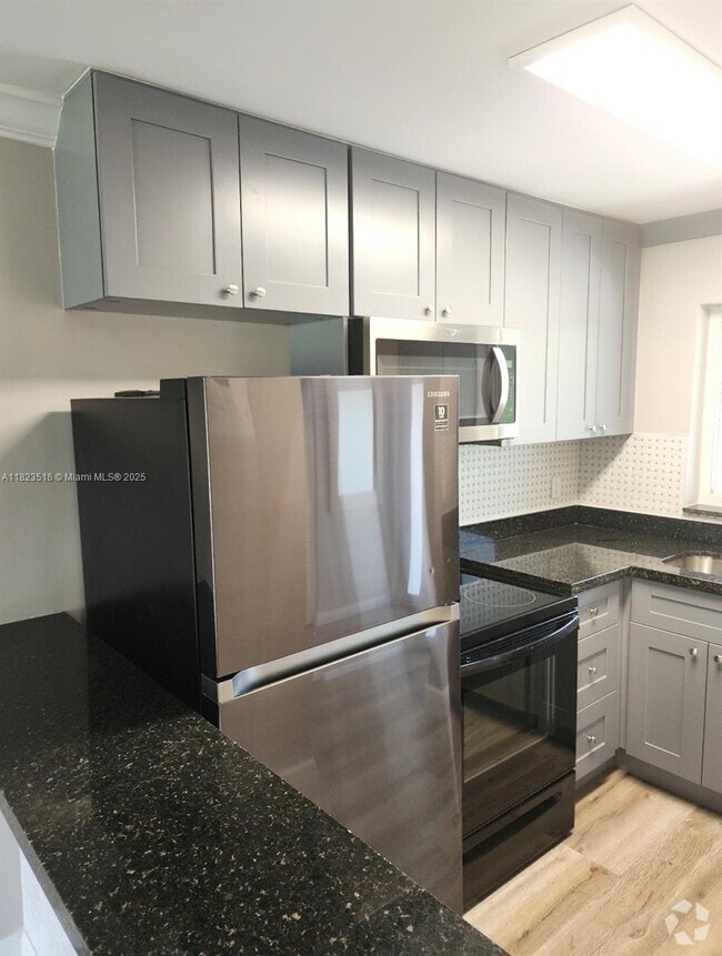 Building Photo - 9855 Sandalfoot Blvd Unit 313 Rental