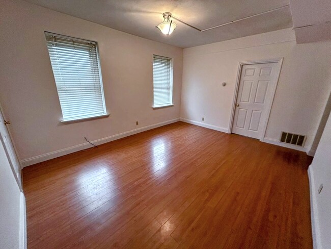 Living Room - 719 Wilmington Ave Apartments Unit A