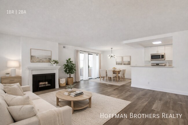 Building Photo - 1533 N Martel Ave Unit 306