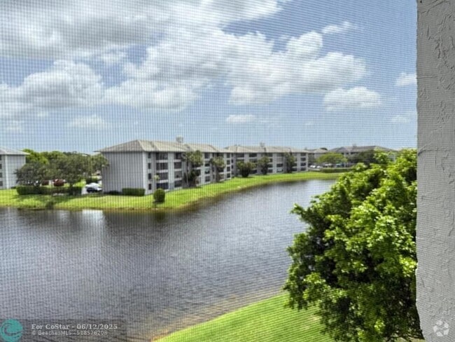 Building Photo - 9420 Poinciana Pl Unit 406 Rental