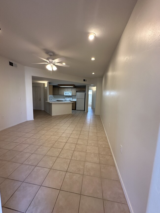 View of Kitchen From Family Room - 10401 N 52nd St Condo Unit Marbeya