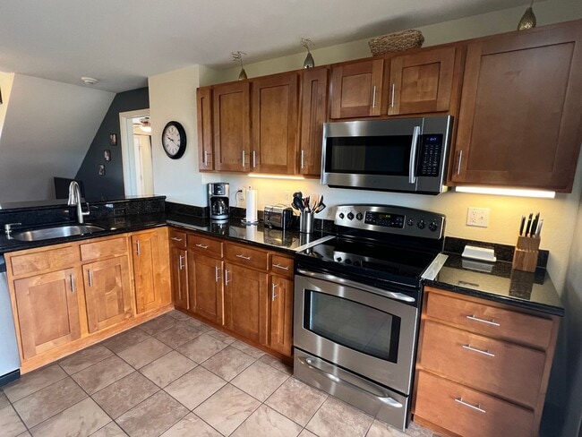 Photo - Top-Floor Ocean View Condo Across from the Beach | Furnished 2BR + Central A/C