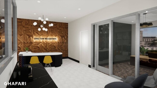 Apartment lobby with seating and coffee maker.