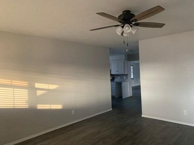 Living Room looking into kitchen and family room - 4403 N Chapman Ave