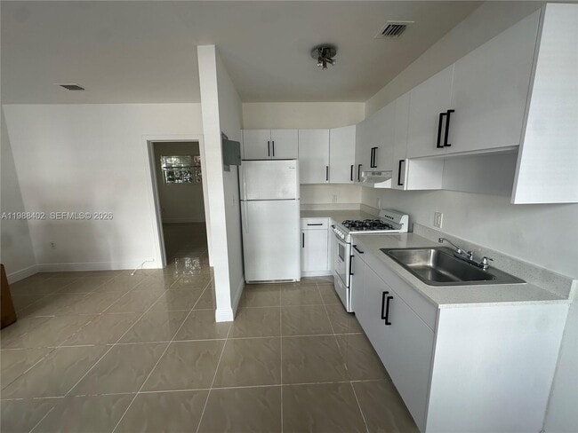 Photo - 740 84th St Unit 3