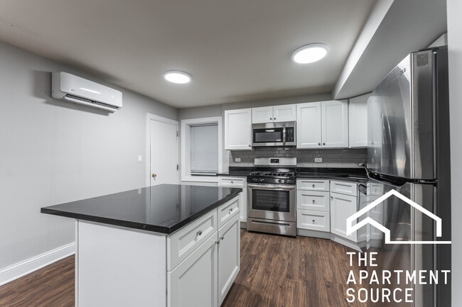 Building Photo - 5746 N Winthrop Ave Unit 203