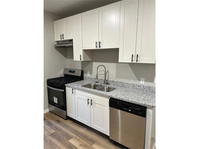 Building Photo - 1023 17th Ave SE Unit 1 Rental