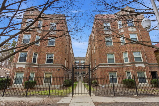 Building Photo - 7318 N Honore St Unit 403