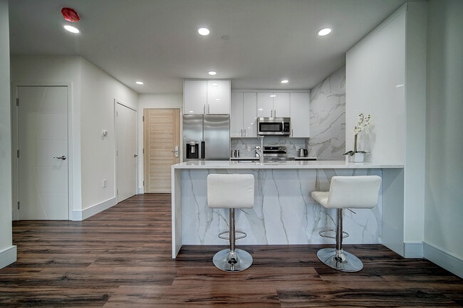 OLYMPIC TOWER APARTMENTS