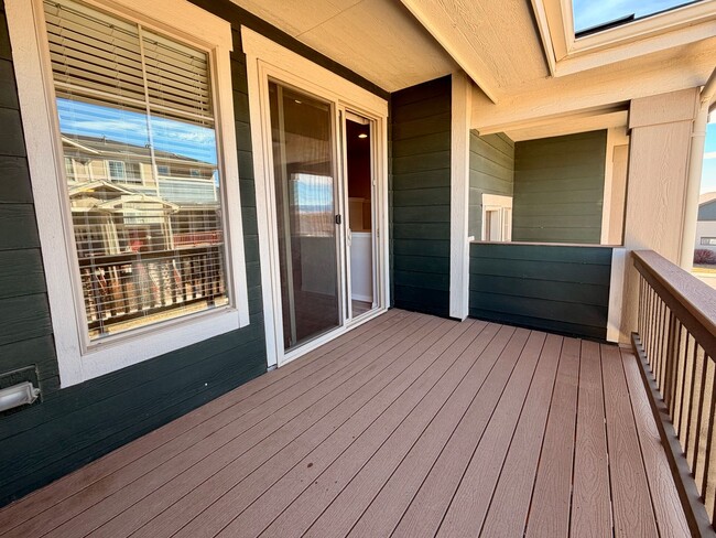 Photo - Move-In Ready 3-Story Townhome with Loft & 2-Car Garage