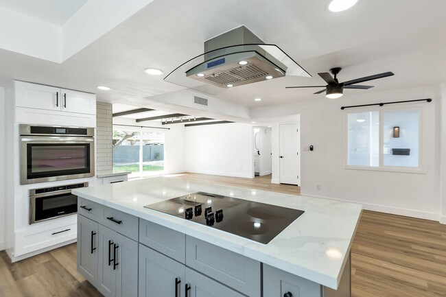 Photo - Remodeled 3 Bed 2 Bath 2 Car Garage Unfurnished 12 month lease with bonus room and AC in 2 car ga...