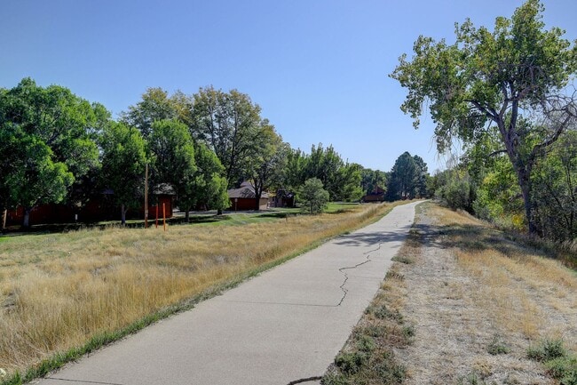 Photo - Penthouse level condo with views of canal and trail!