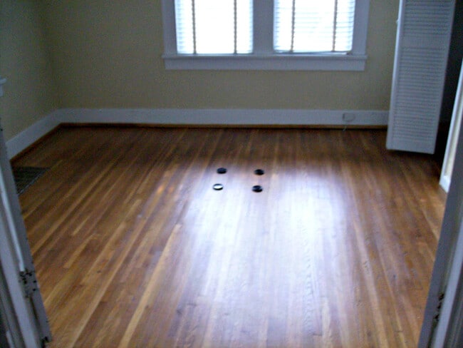 bedroom 1 hardwood floors - 1706 Villa Pl Unit Cottage