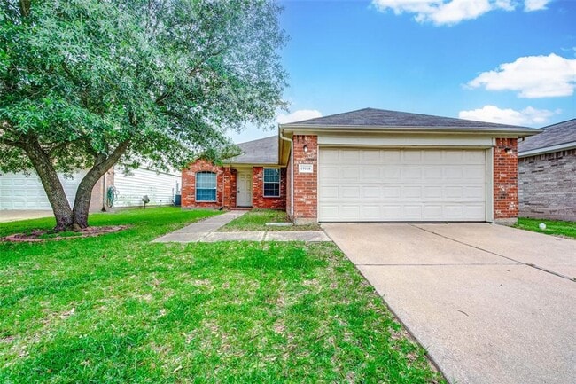 Building Photo - This one-story, three-bedroom, two bath ho... Rental