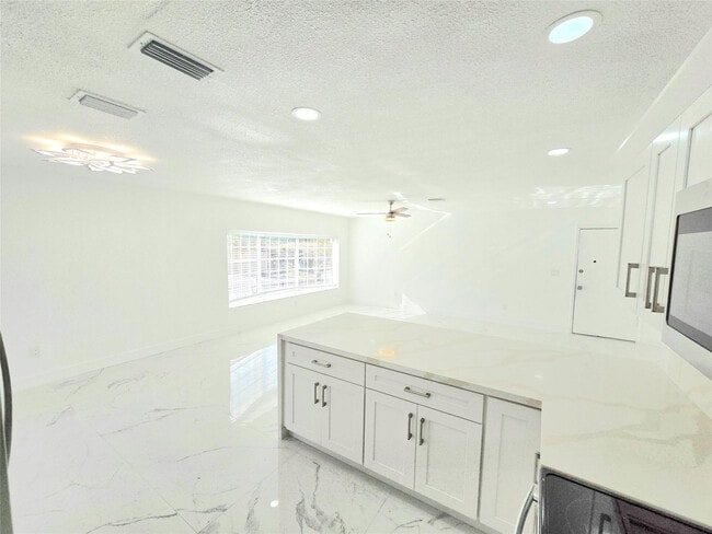 Photo - 1848 NW 55th Ave Unidad 4x