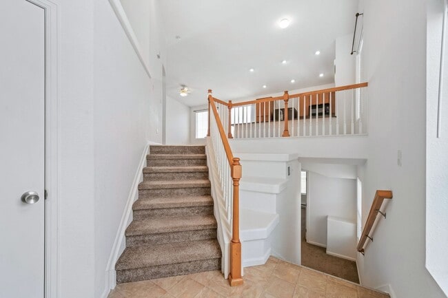 Photo - Tri-Level with Primary at top and 2 bedrooms on the lower level.