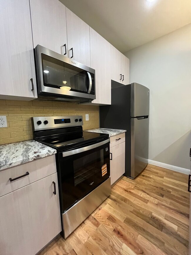 Building Photo - 6122 Walnut St Unit 1F Rental