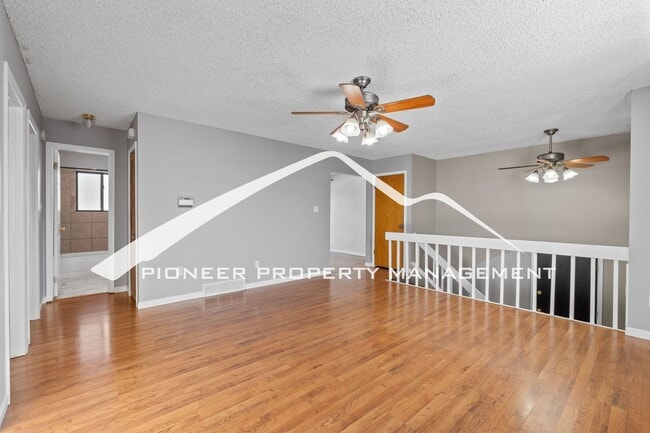 Photo - Spacious Split-Level Home in D20 with Mountain Views, 2 Car Garage, Fenced Yard and AC!