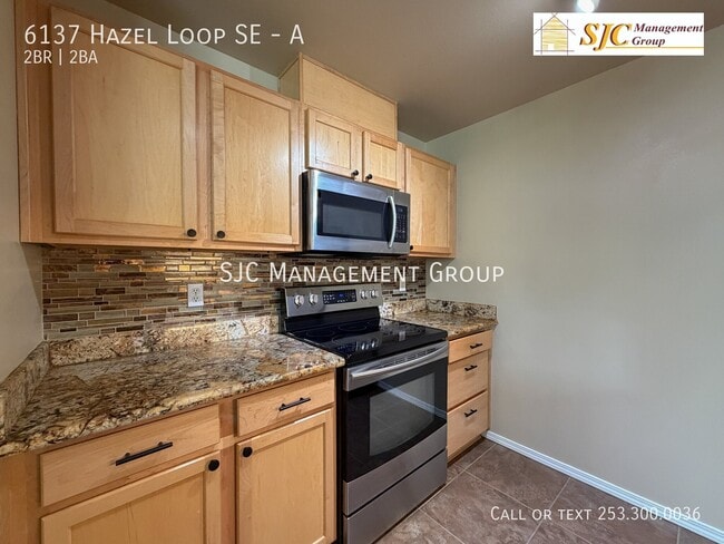 Photo - 6137 Hazel Loop SE Unit A