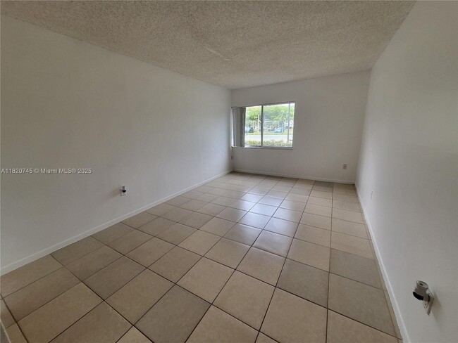 Photo - 721 N Pine Island Rd Unit 121