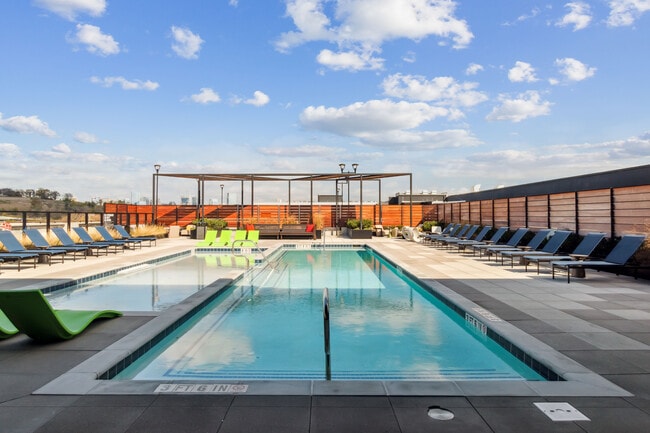 Soak up the sun and skyline views at our rooftop oasis.