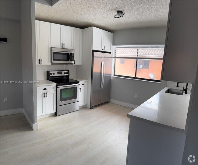 Building Photo - 6375 W 27th Way Unit 24 (203) Rental