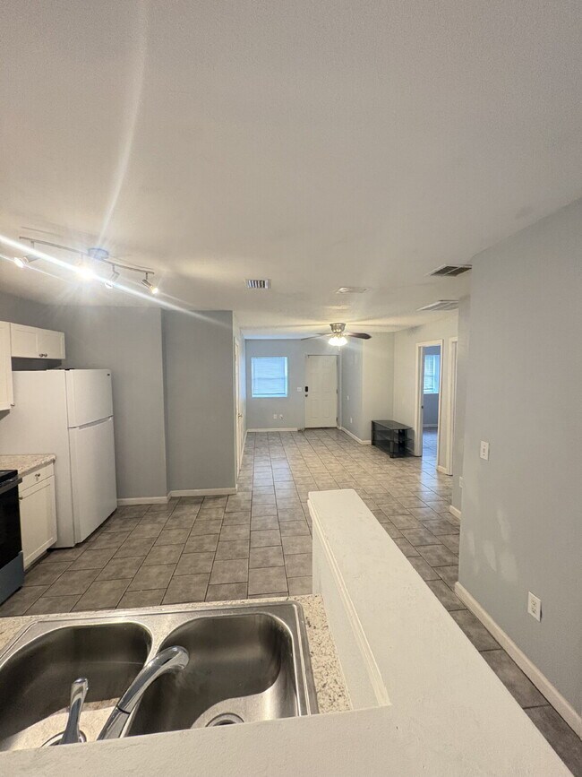 Photo - Open floor plan, four-bedroom two-bathroom with washer and dryer Unit 2