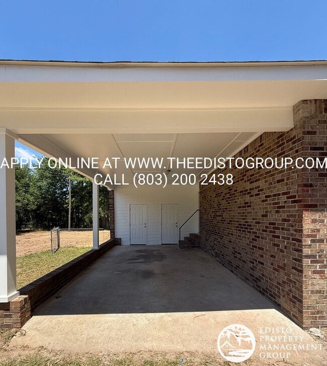 Photo - Updated 2BR Home with Large Yard & Carport Near Town