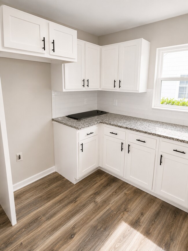 Photo - Newly Rehabbed 3-Bedroom Home with Modern Finishes & Fenced Backyard