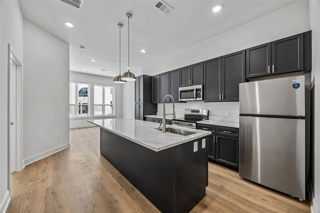 Building Photo - 2010 Commerce St Unit B201