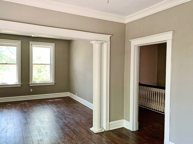 Dining area looking into living room and foyer - 5201 Murdoch Ave Unit A