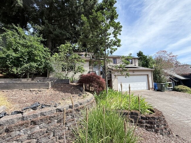 Photo - Beautiful 4 Bed, 2 Bath Single Family Home 2 Attached Car Garage and Laundry In Unit!