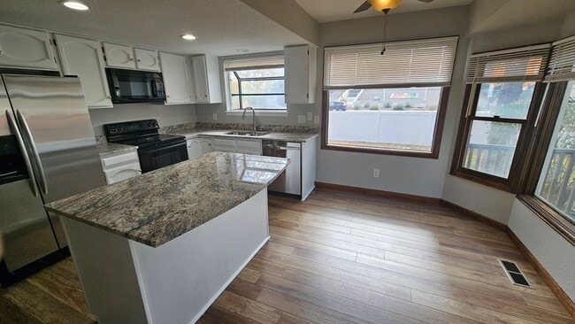 Photo - Spacious Townhome with Finished Basement i...