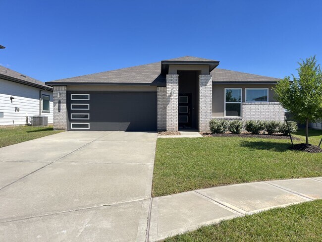 Photo - Modern 4-Bed Home with Office in Fosters Ridge Near The Woodlands | Open Layout & Resort-Style Am...