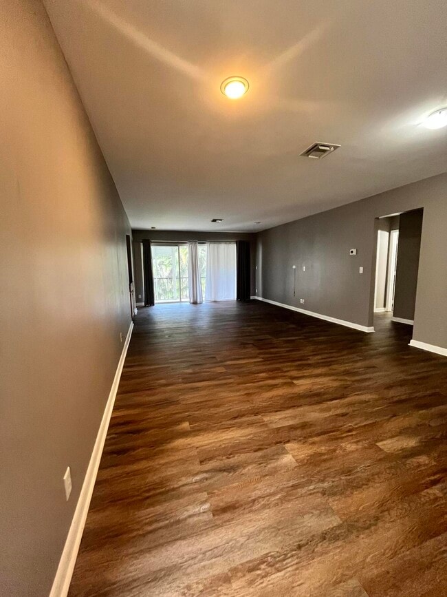 Building Photo - 1700 Presidential Way Unit 203