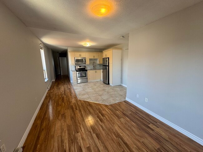 Photo - 2 Bedroom On Corner or King and Locke St Includes Parking Unit 3