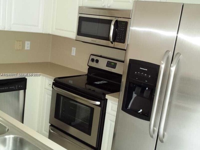 Building Photo - 10740 NW 83rd St Unit 6-11