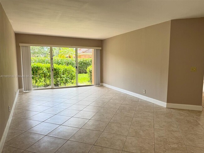 Photo - 8781 Wiles Rd Unit 108