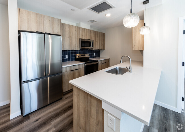 Earl floorplan with blue backsplash - Dear Madison Rental