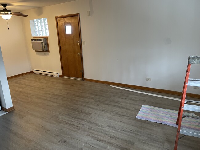 Living room with natural light - 17828 Park Ave Apartments Unit 6