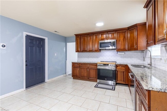 Photo - Welcome to this beautifully maintained 4-bedroom! "ASK ABOUT OUR ZERO DEPOSIT"